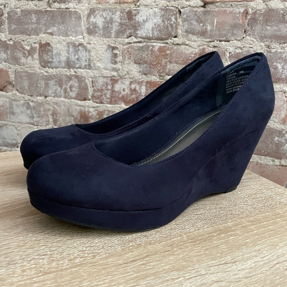 Navy suede pumps
